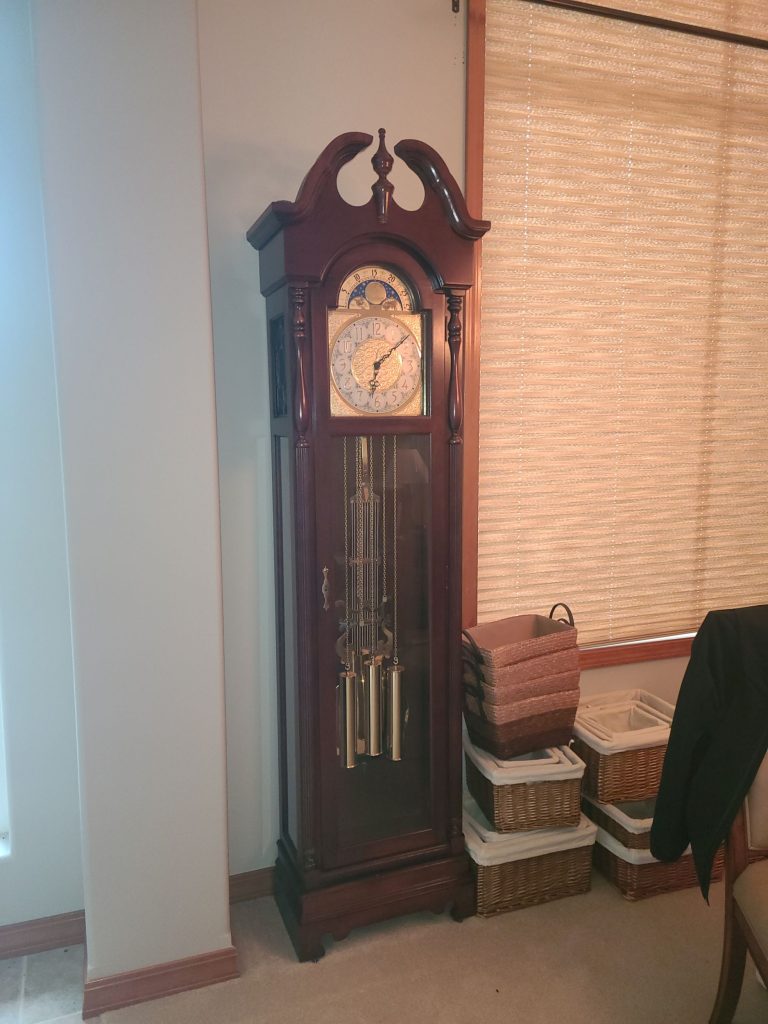 Grandfather clock for sale at a Tri-Cities estate sale