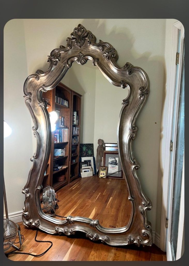Ornate antique silver floor mirror for sale at a Tri-Cities estate sale
