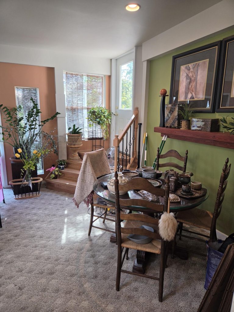 Bright dining room arranged for an estate sale