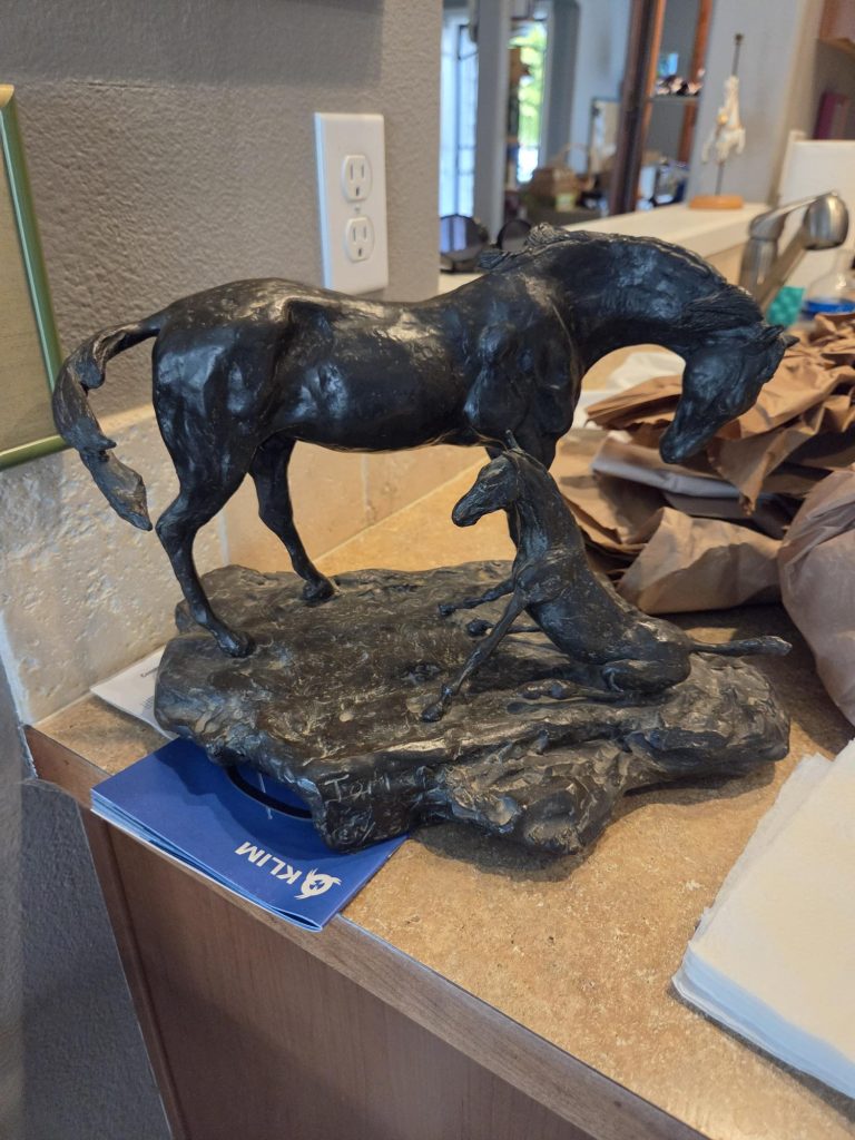 Bronze horse sculpture for sale at a Pasco estate sale